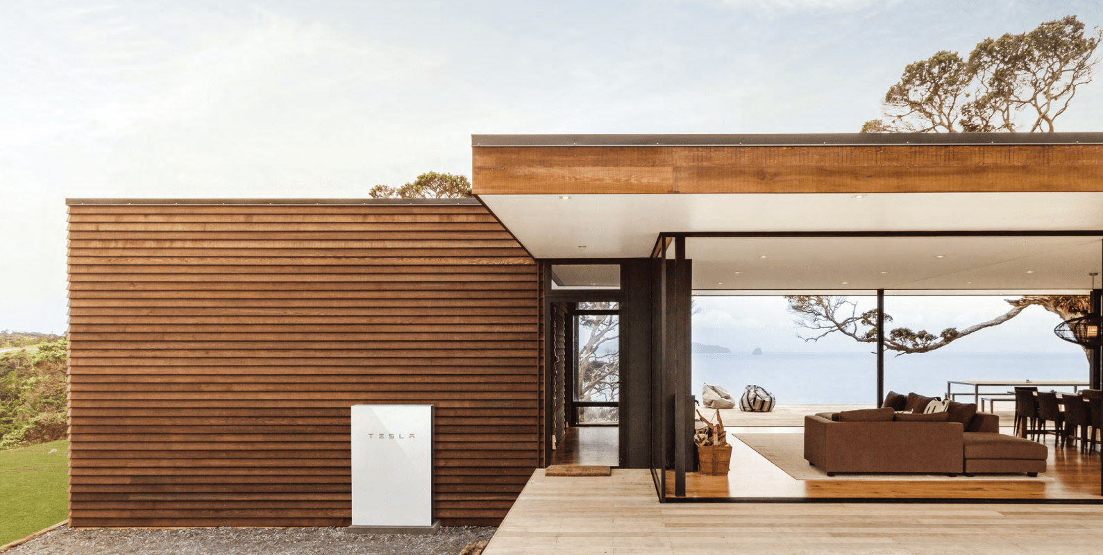 Luxurious cliffside Airbnb in South Australia with a Tesla Powerwall 2 installed next to the stylish wooden exterior